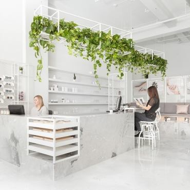 All-White Interior of the Le Manoir Boutique in Montreal by Tuxedo